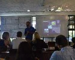 Teacher Trainer explaining teaching theories